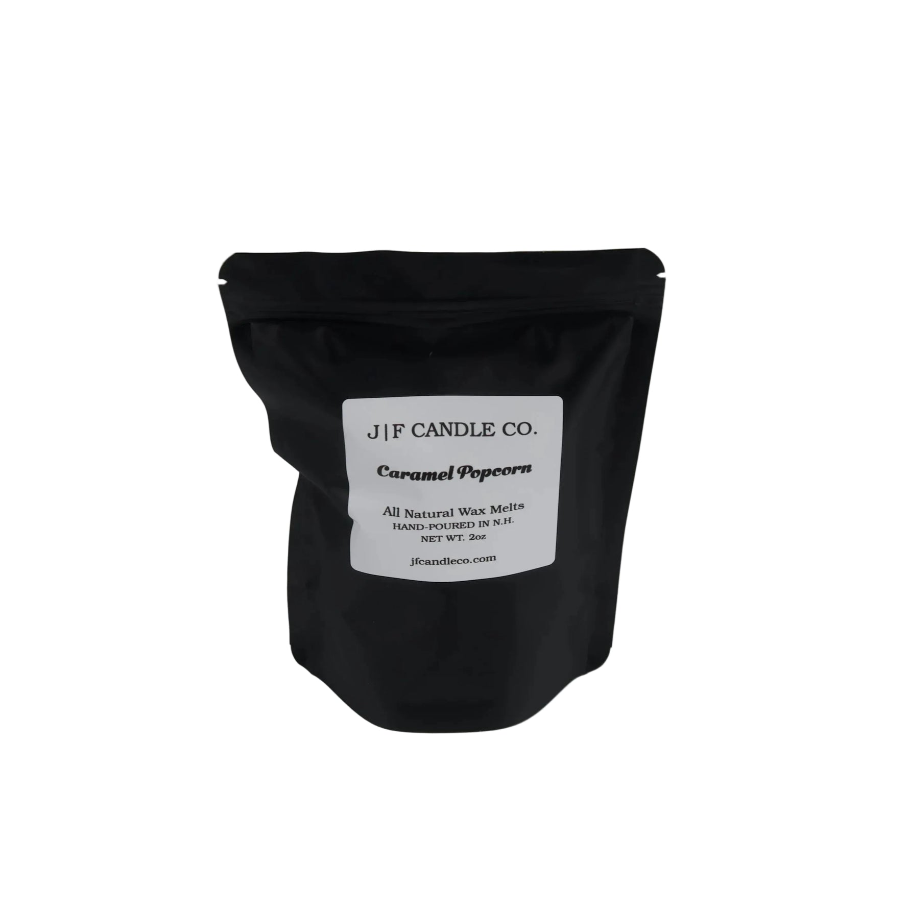 A black resealable stand-up pouch with a white label reading 'JF CANDLE CO.' and 'Caramel Popcorn' on a plain white background.