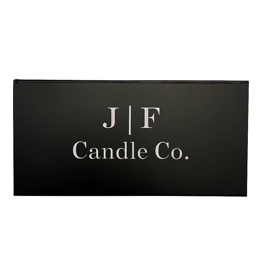 A closed black rectangular gift box from 
J | F Candle Co. featuring the brand’s minimalist white logo centered on the lid, photographed against a clean white background.