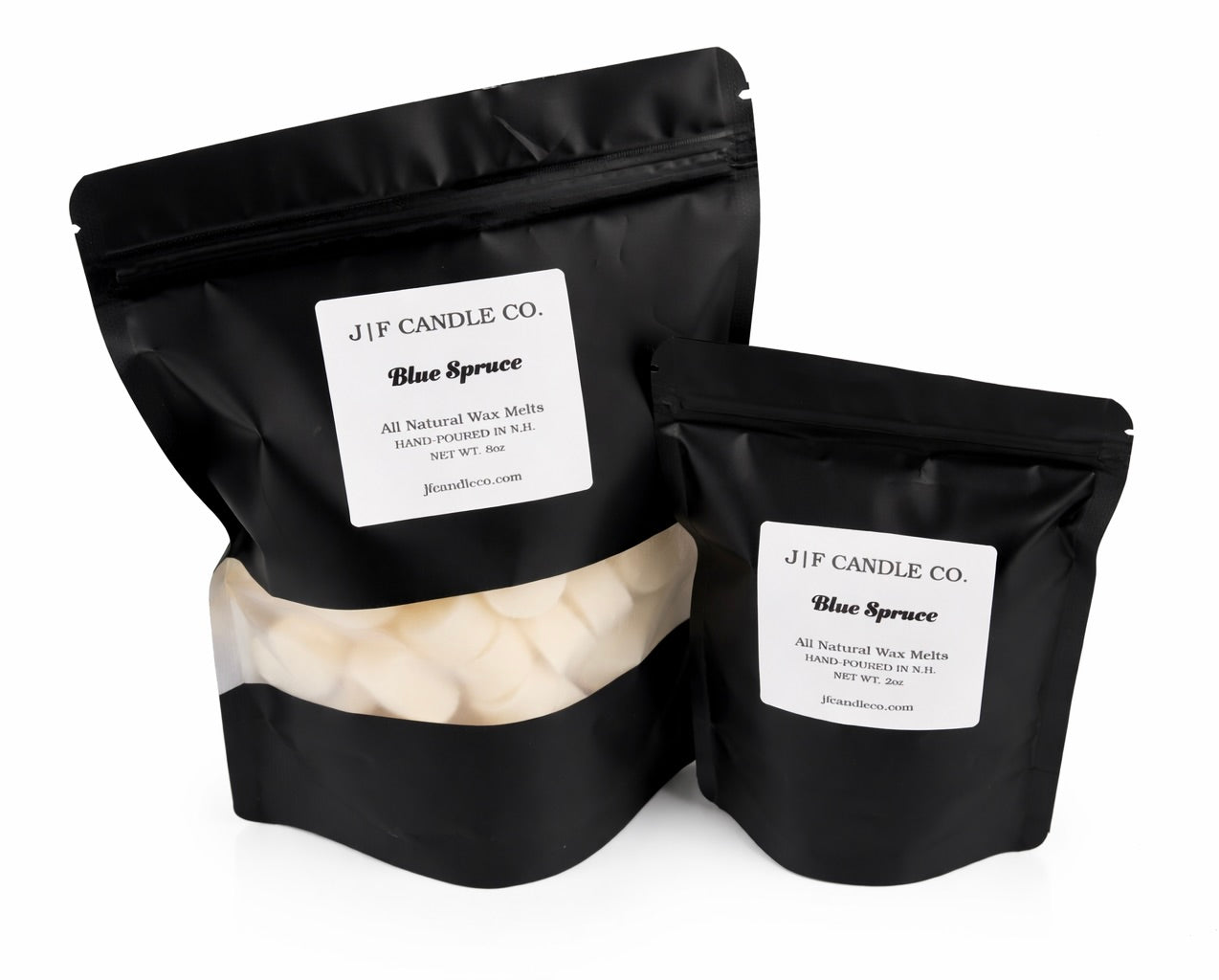 J | F Candle Co. Blue Spruce wax melts in 8 oz and 2 oz black stand-up pouches on a clean white background