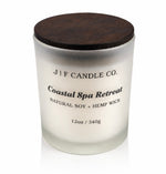 Coastal Spa Retreat soy candle by J | F Candle Co. in a frosted glass jar with a wooden lid, clean minimal product photo on a white background.