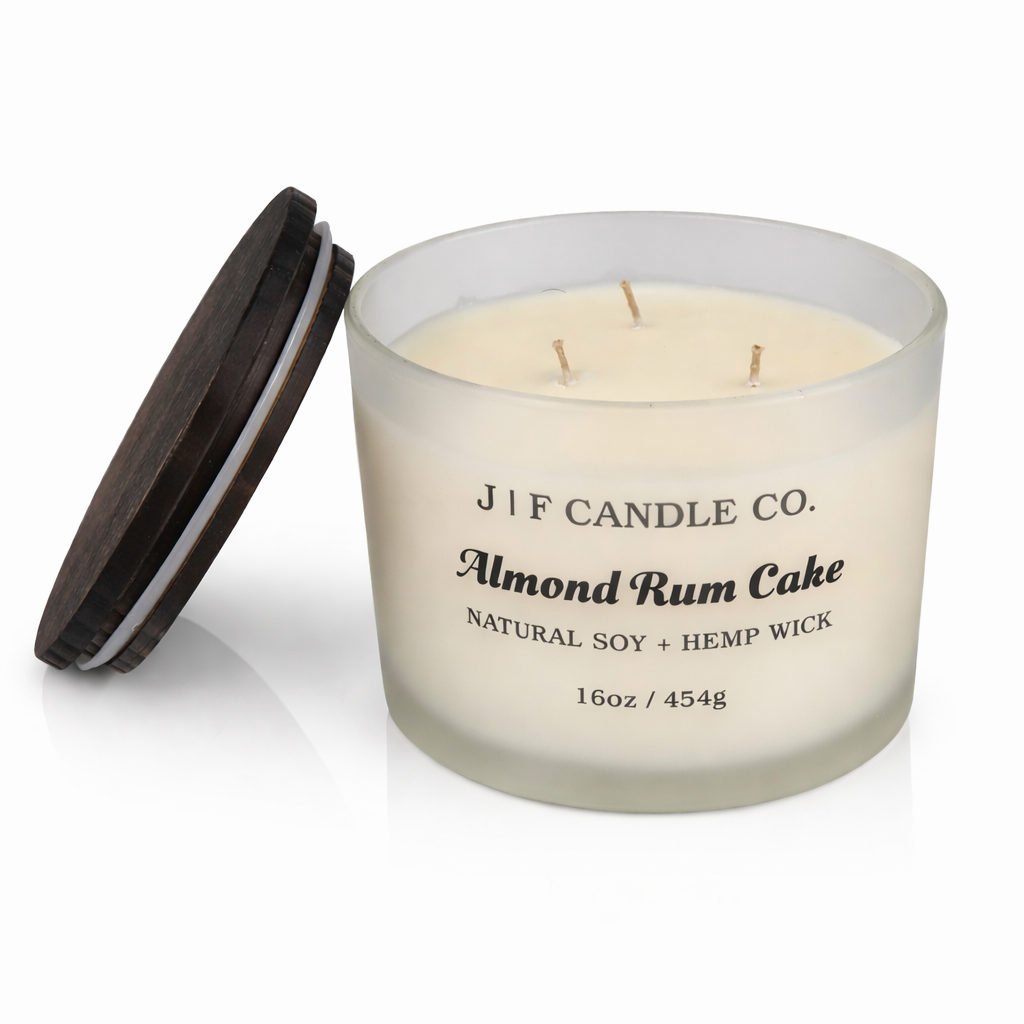 J | F Candle Co Almond Rum Cake luxury soy candle 16 oz three wick frosted glass jar with wooden lid