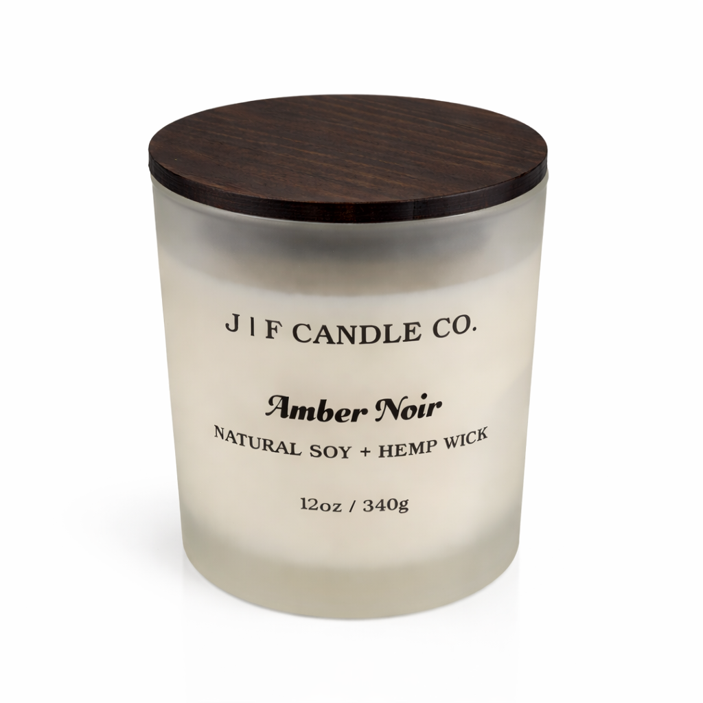 J F Candle Co Amber Noir 12oz luxury soy candle in frosted glass jar with dark wood lid, natural soy wax and hemp wick
