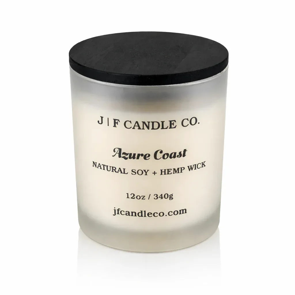 J | F Candle Co. Azure Coast 12oz frosted glass soy candle with clean white background and soft reflection.