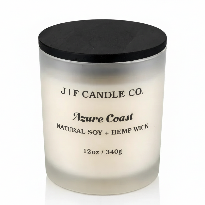 J | F Candle Co. Azure Coast 12oz frosted glass soy candle with clean white background and soft reflection.