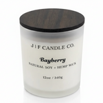 Bayberry soy candle in a frosted glass jar with wooden lid on a white background with soft reflection, by J | F Candle Co.