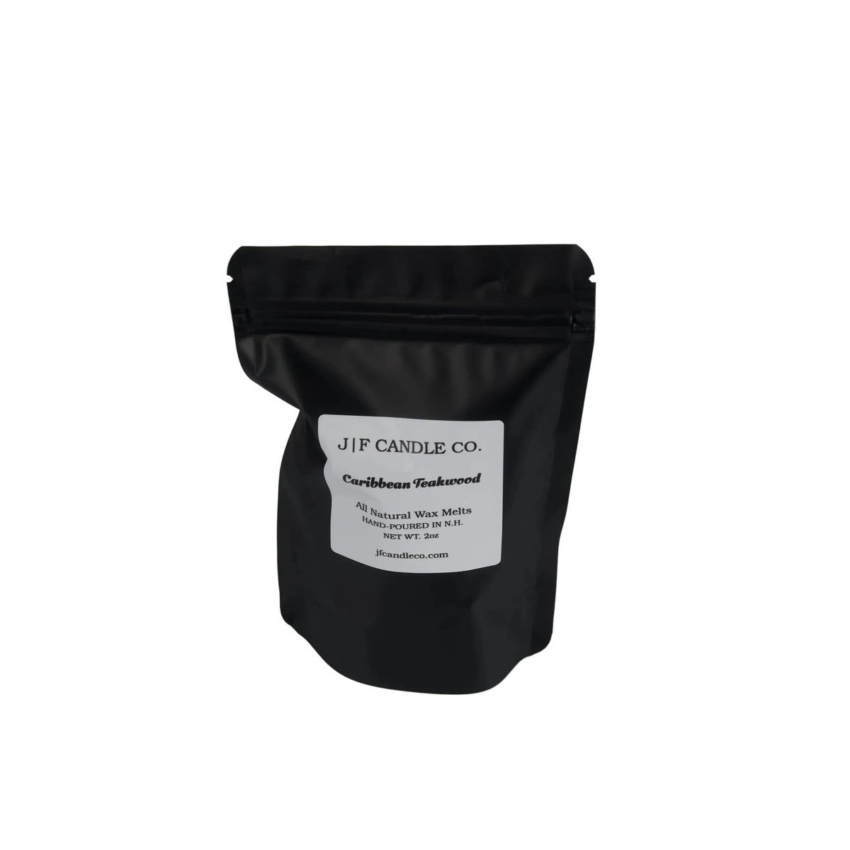 Caribbean Teakwood 2 oz soy wax melt package by JF Candle Co. in black resealable packaging on a gray background