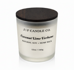 J | F Candle Co. Coconut Lime Verbena 12oz soy candle in frosted glass jar with wooden lid on a clean white background with soft reflection