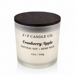 J | F Candle Co Cranberry Apple 12oz soy candle in frosted glass jar with wooden lid on clean white background