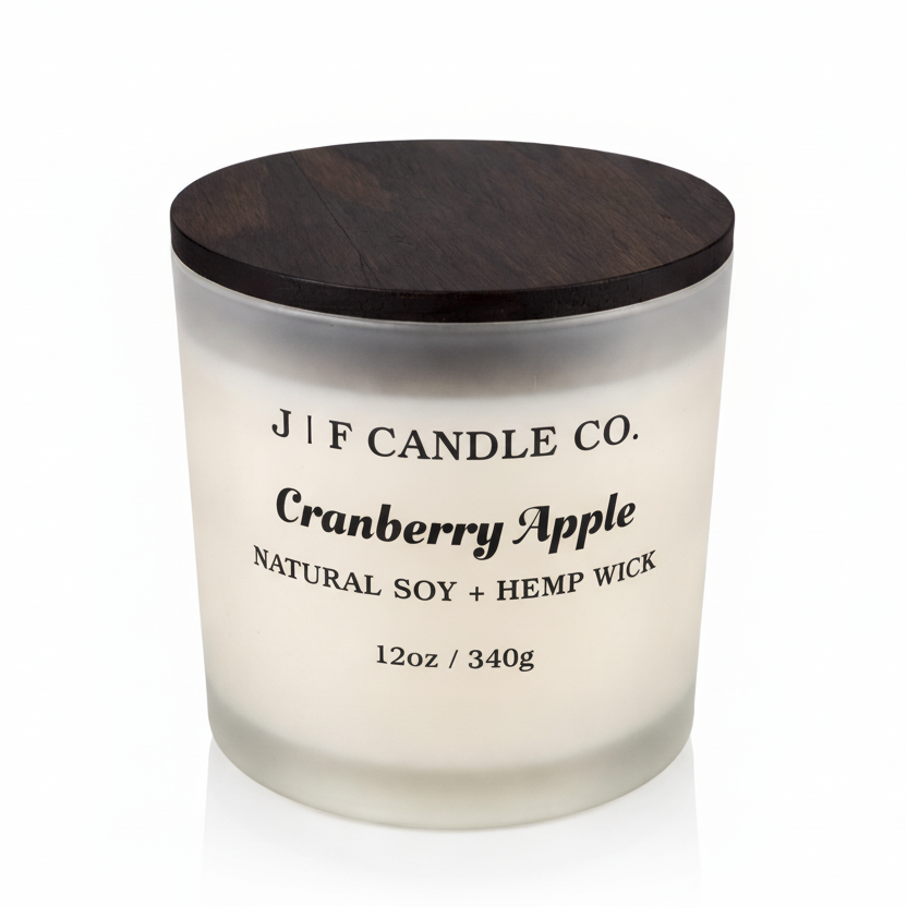 J | F Candle Co Cranberry Apple 12oz soy candle in frosted glass jar with wooden lid on clean white background