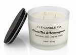 J | F Candle Co. Green Tea & Lemongrass luxury soy candle, 16oz three wick in frosted glass jar with lid off beside candle, clean white background and soft reflection