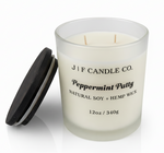 J | F Candle Co Peppermint Patty 12oz soy candle in frosted glass jar with wooden lid beside candle, clean white background with soft reflection, mint chocolate fragrance candle