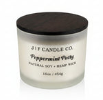 J | F Candle Co Peppermint Patty 16oz soy candle in frosted glass jar with wooden lid, clean white background with soft reflection, mint chocolate fragrance candle
