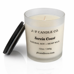 Open Serein Coast soy candle in a frosted glass jar with wooden lid beside it on a white background with soft reflection, by J | F Candle Co.