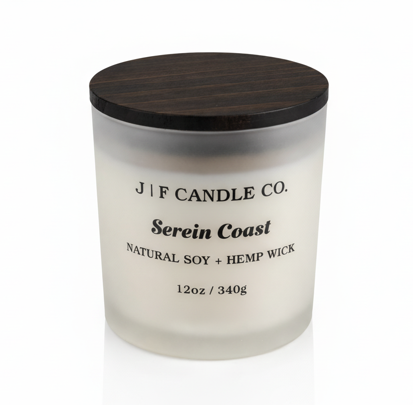 J | F Candle Co. Serein Coast luxury soy candle in frosted glass jar with dark wood lid, clean white background and soft reflection, 12oz