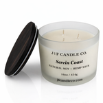 Open 16 oz Serein Coast soy candle with three hemp wicks in a frosted glass jar with wooden lid beside it on a white background with soft reflection, by J | F Candle Co.