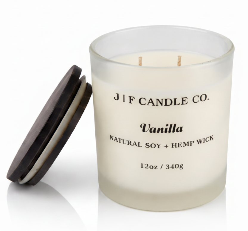 Vanilla soy candle in frosted glass jar with hemp wick by J F Candle Co, 12 oz clean-burning luxury candle with wooden lid and soft reflection