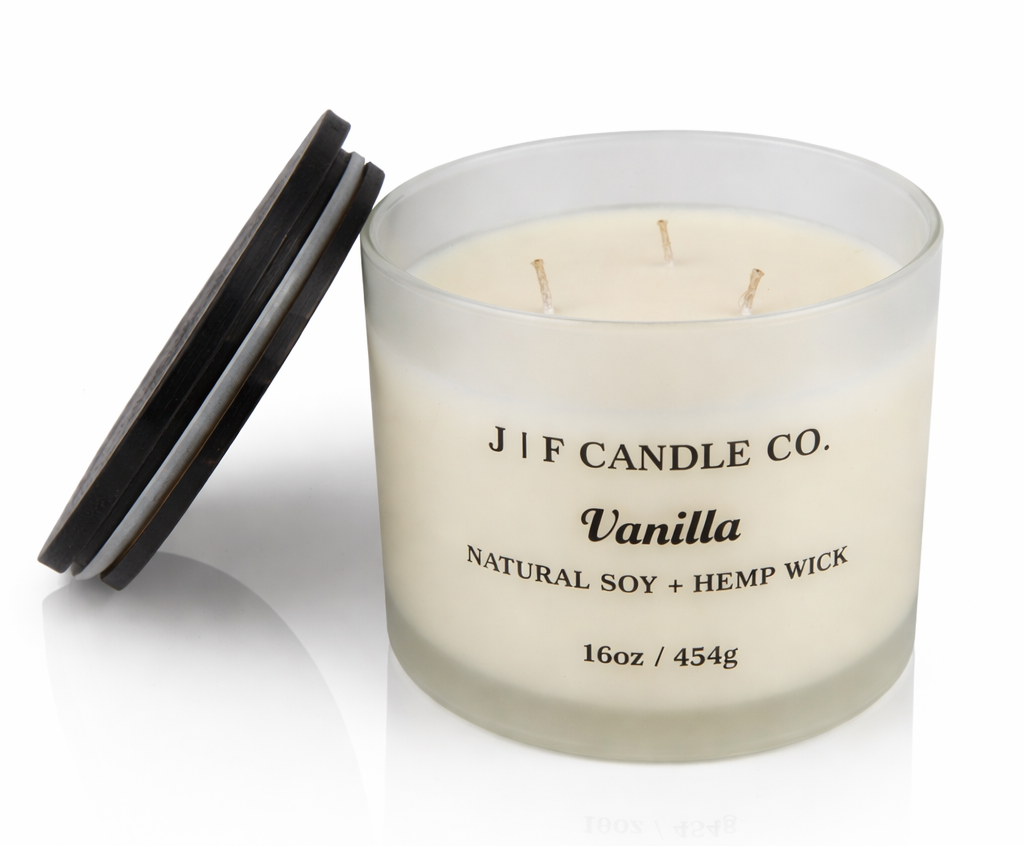 Vanilla soy candle in frosted glass jar with three hemp wicks by J F Candle Co, 16 oz clean-burning luxury candle with wooden lid and soft reflection
