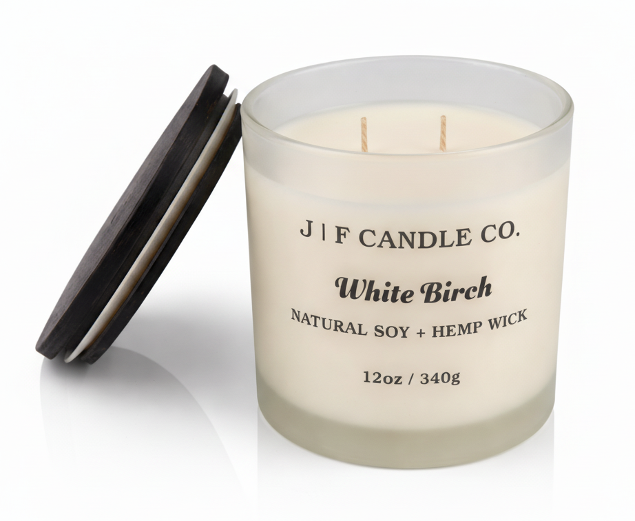 White Birch soy candle in frosted glass jar with lid off by J F Candle Co, 12 oz clean-burning luxury candle with soft reflection