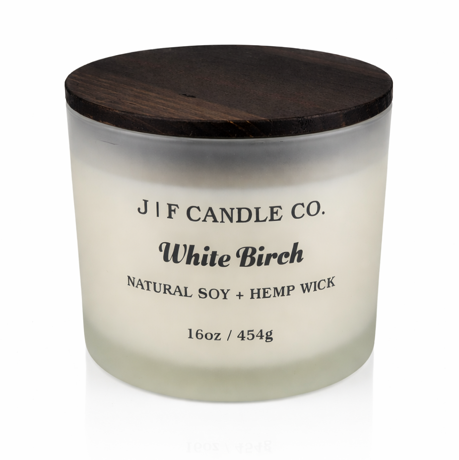 White Birch soy candle in frosted glass jar with wooden lid by J F Candle Co, 16 oz clean-burning luxury candle with soft reflection