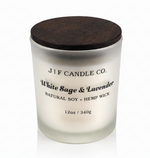 White Sage & Lavender soy candle by J | F Candle Co. in frosted glass jar with wooden lid, clean white background and soft reflection, luxury hand-poured candle